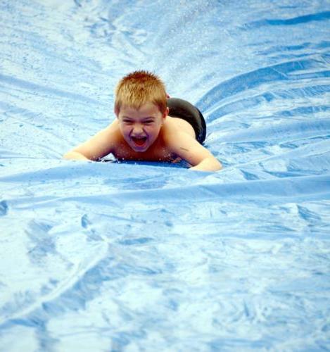 Child on water slide